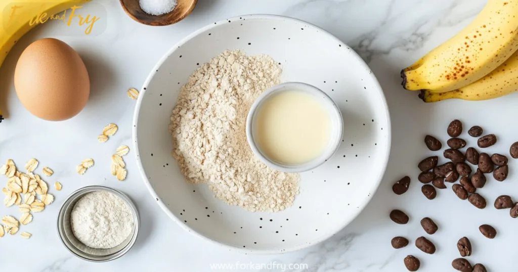 Neatly arranged protein mug cake ingredients on white plate with soft natural lighting