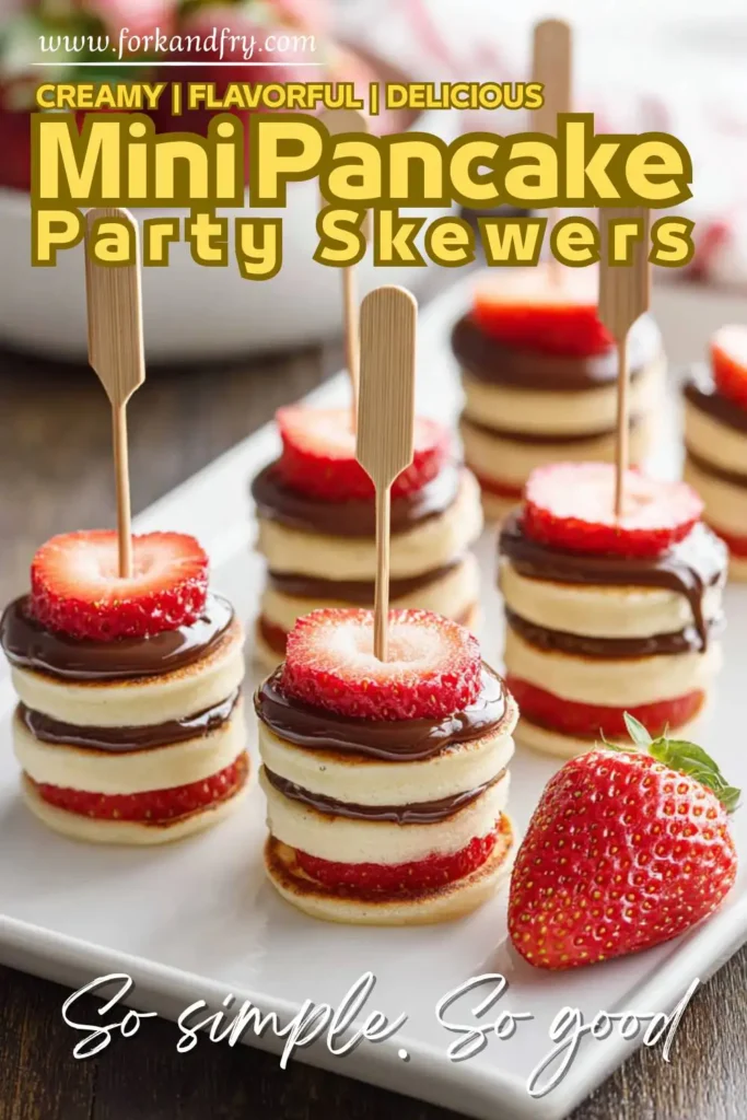 Pancake kabobs with berries and chocolate spread