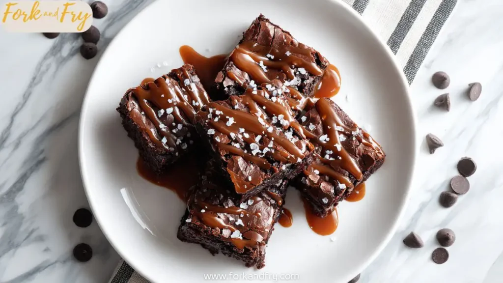 Top view of salted caramel brownies with shiny caramel drizzle