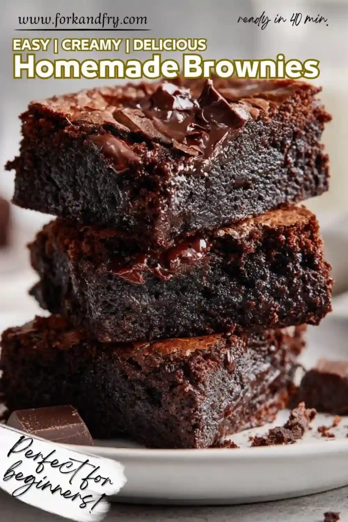 Close-up of sliced fudgy brownies on parchment with shiny tops under bright daylight, minimal modern setup.