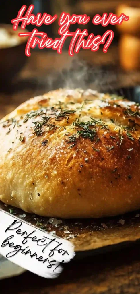 Golden rustic bread with herbs and steam rising, styled for Pinterest