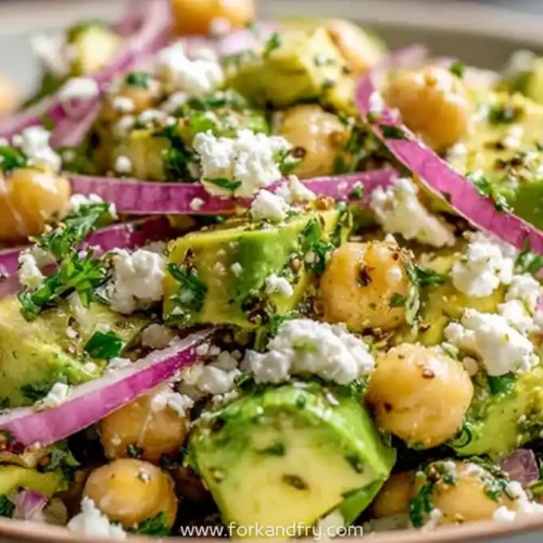 avocado chickpea salad with red onion, feta, parsley, and vinaigrette in a bowl, Fork and Fry branding