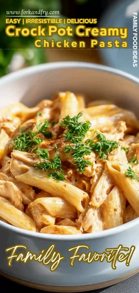 Crockpot Creamy Chicken Pasta – Easy & Irresistible crockpot creamy chicken pasta with penne and fresh herbs in a white bowl