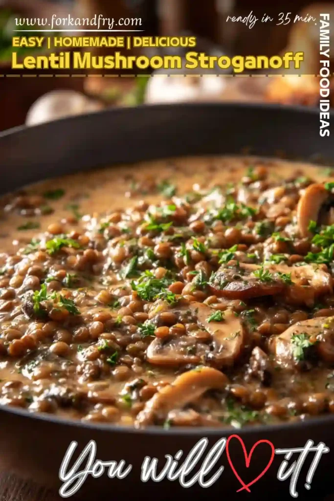 Lentil Mushroom Stroganoff with Creamy Sauce and Herbs lentil mushroom stroganoff with fresh herbs in creamy sauce in a black pan