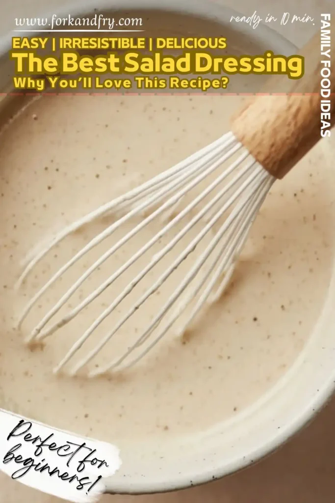 Easy Creamy Salad Dressing Mixed with Whisk creamy salad dressing being whisked in speckled ceramic bowl