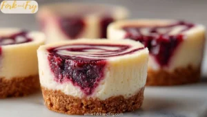 Bite Size Cheesecake Cups with Berry Swirl