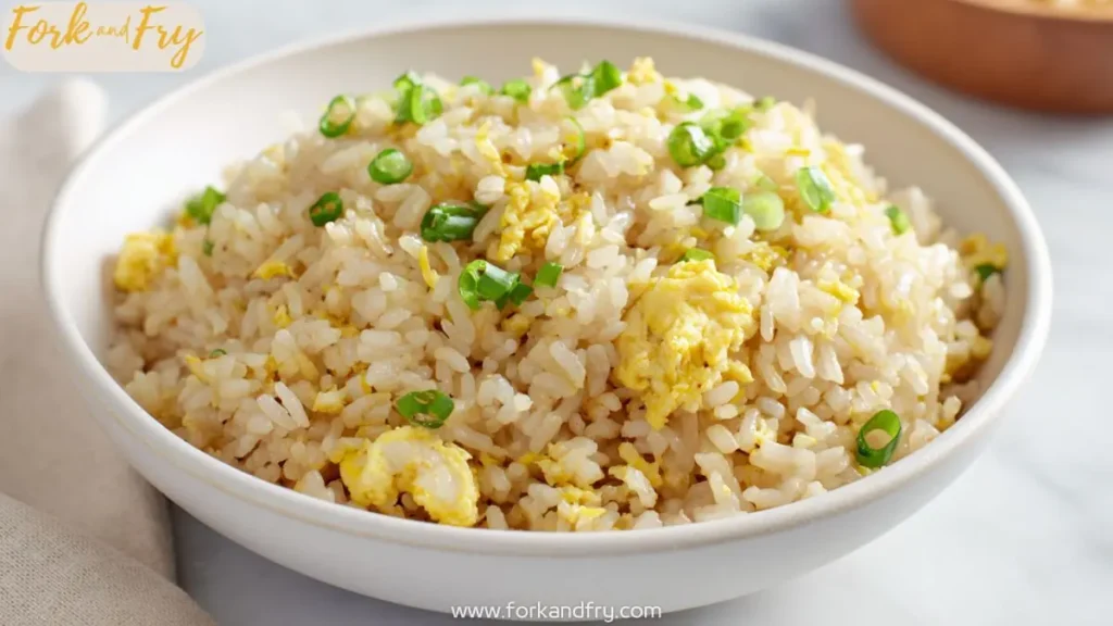 bowl of Japanese fried rice with scrambled eggs and chopped green onions