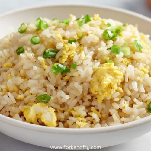 bowl of Japanese fried rice with scrambled eggs and chopped green onions