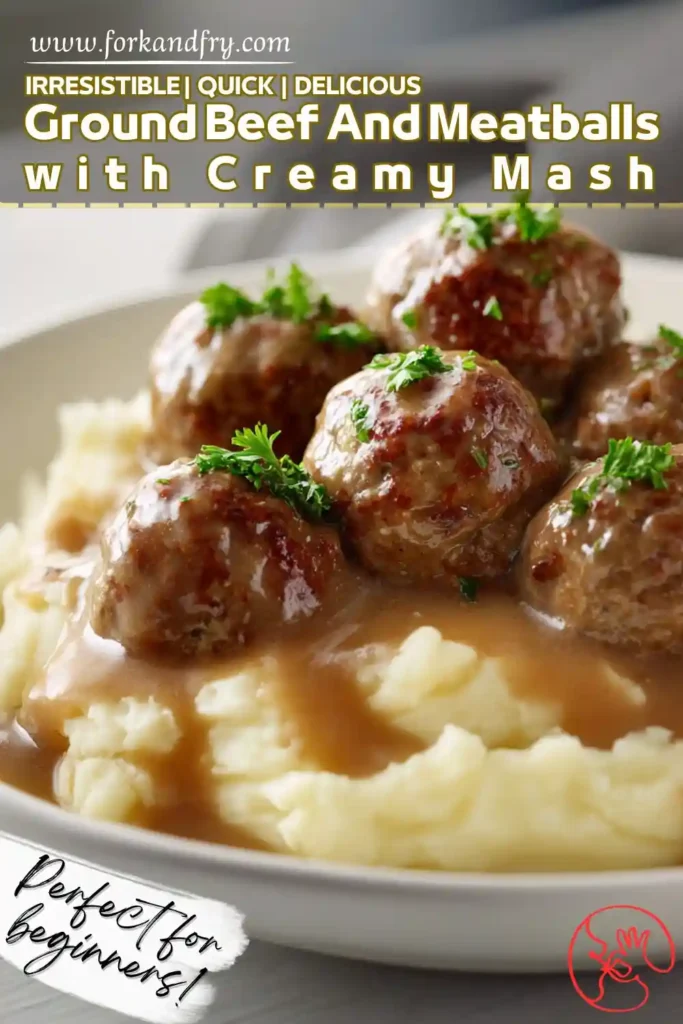 Ground beef meatballs topped with brown gravy over creamy mashed potatoes, garnished with parsley