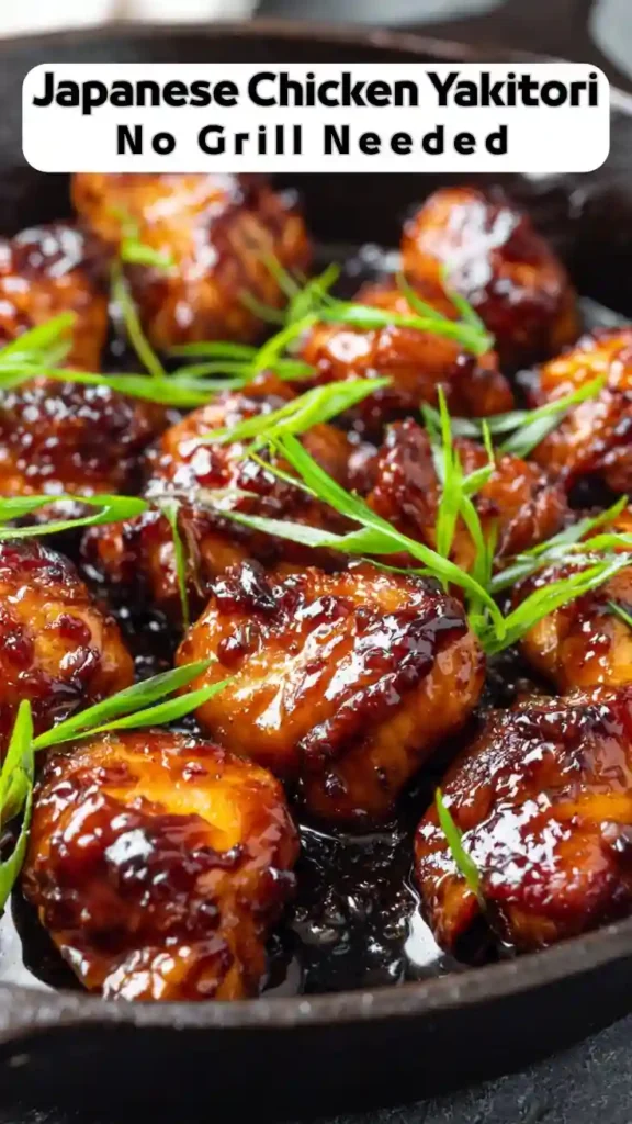 Japanese chicken yakitori glazed in savory soy sauce with green onions cooked in skillet