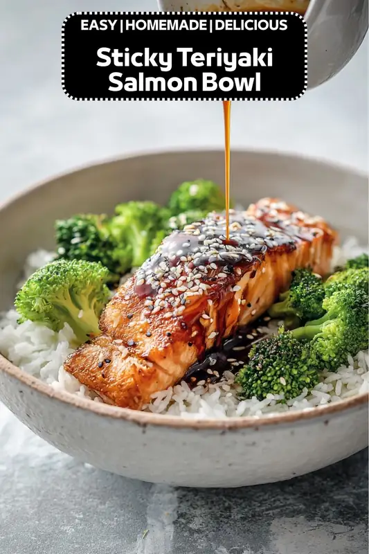 sticky teriyaki salmon bowl with glazed salmon fillet, rice, broccoli, sesame seeds and sauce drizzle