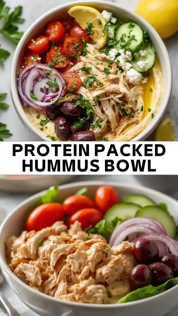 Protein packed hummus bowl with shredded chicken, hummus, cherry tomatoes, cucumbers, red onion, Kalamata olives, feta cheese, and lemon.