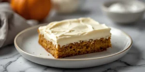 Fluffy Pumpkin Sugar Cookie Bars with Spiced Frosting